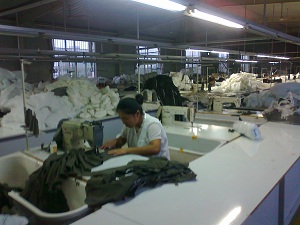 Workers sewing in the factory